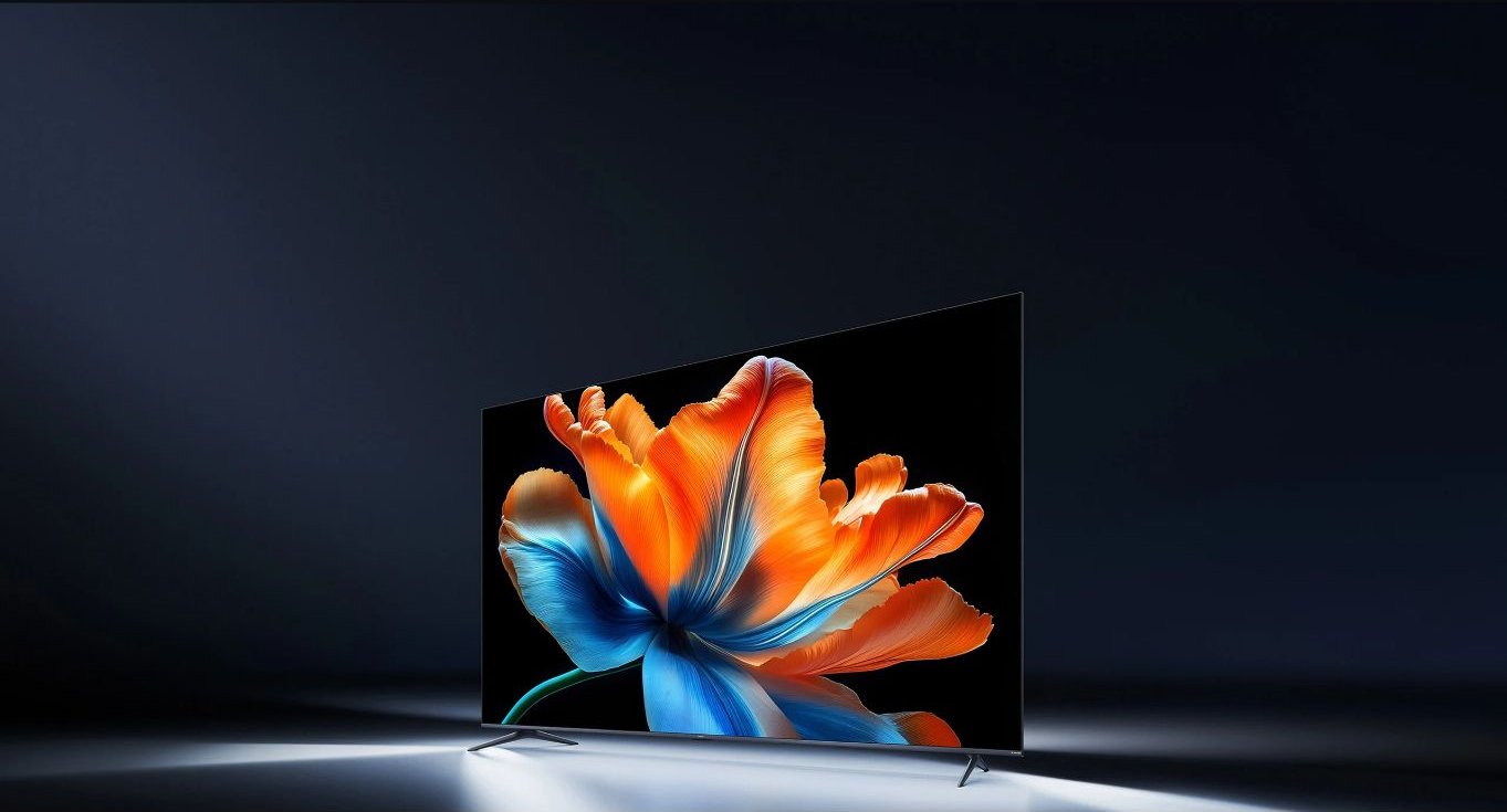 نمای روبهروی تلویزیون Xiaomi TV S Mini LED 98 2026 با تصویر گل رنگارنگ، عکس رسمی شیائومی